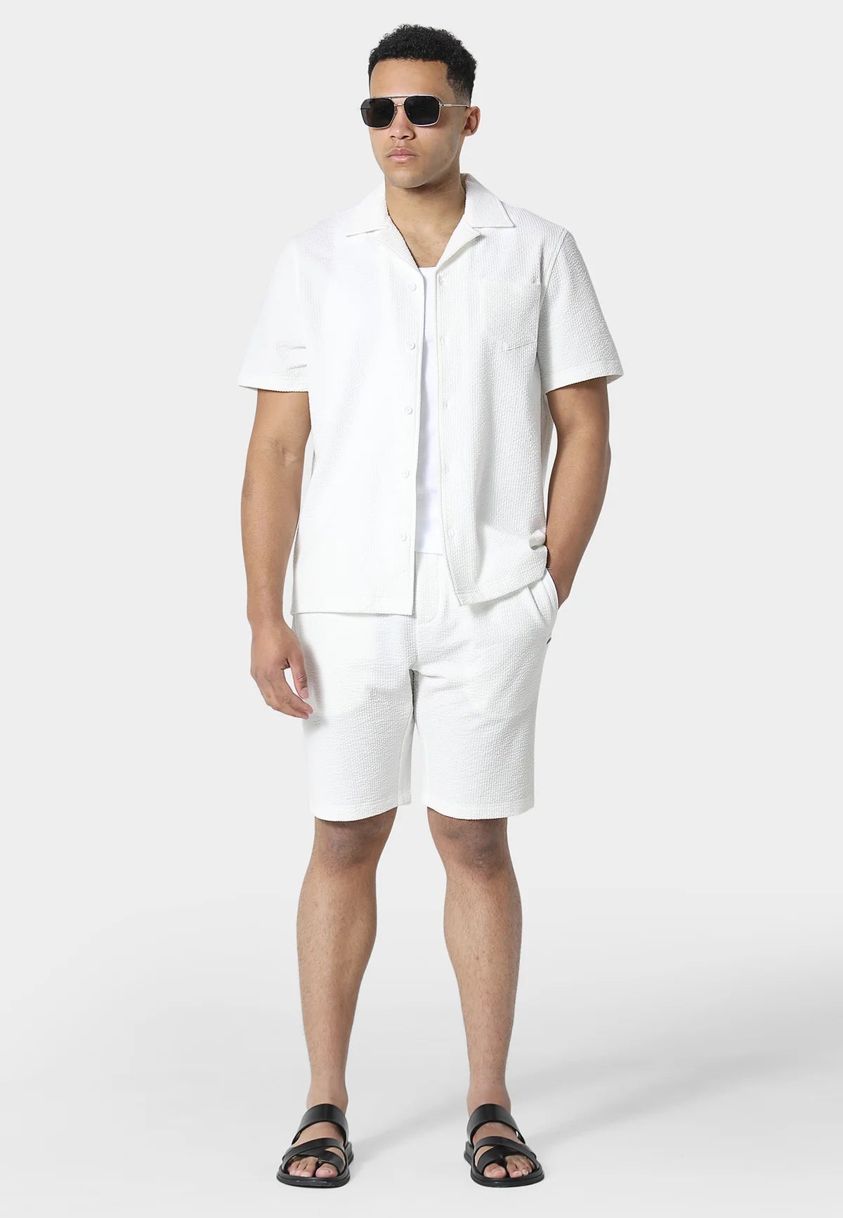 Clique 883Police Picton white jog shorts set with matching shorts and top, casual athletic style, front view on a plain background.