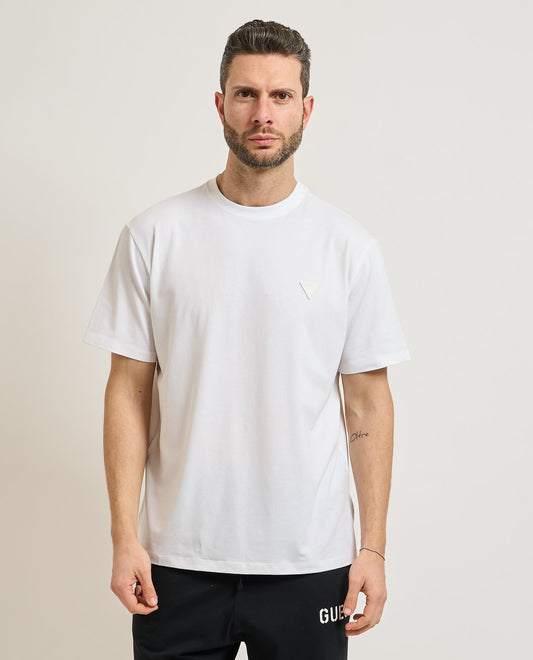 White GUESS men's crew neck T-shirt with short sleeves and soft cotton fabric, front view.