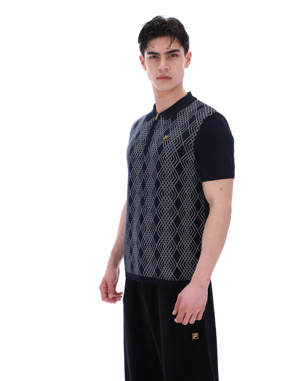 FILA Castello jacquard knitted polo shirt by Clique in black and white with a zip closure, front view.