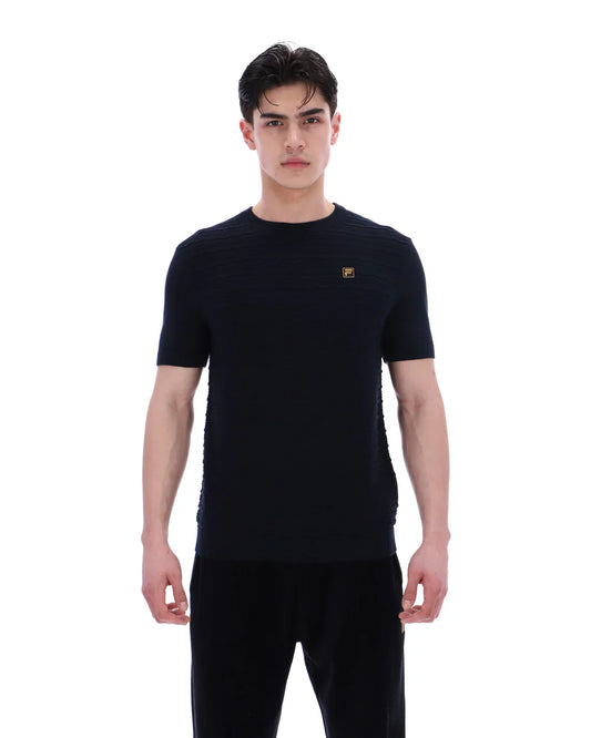 Black FILA DON Textures knitted T-shirt by Clique featuring textured fabric, displayed on a flat lay.