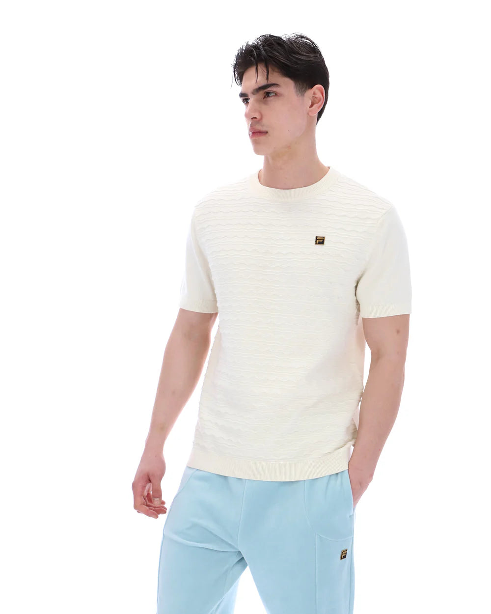 FILA Don textured knitted T-shirt in Coconut Milk by Clique, featuring a soft, patterned knit fabric and casual fit.