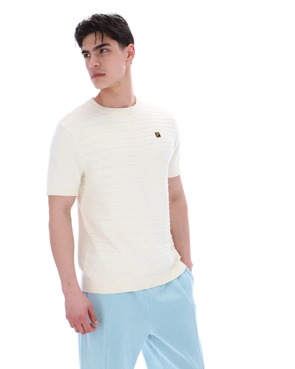 FILA Don textured knitted T-shirt by Clique in coconut milk color, featuring a casual fit and subtle knit pattern.