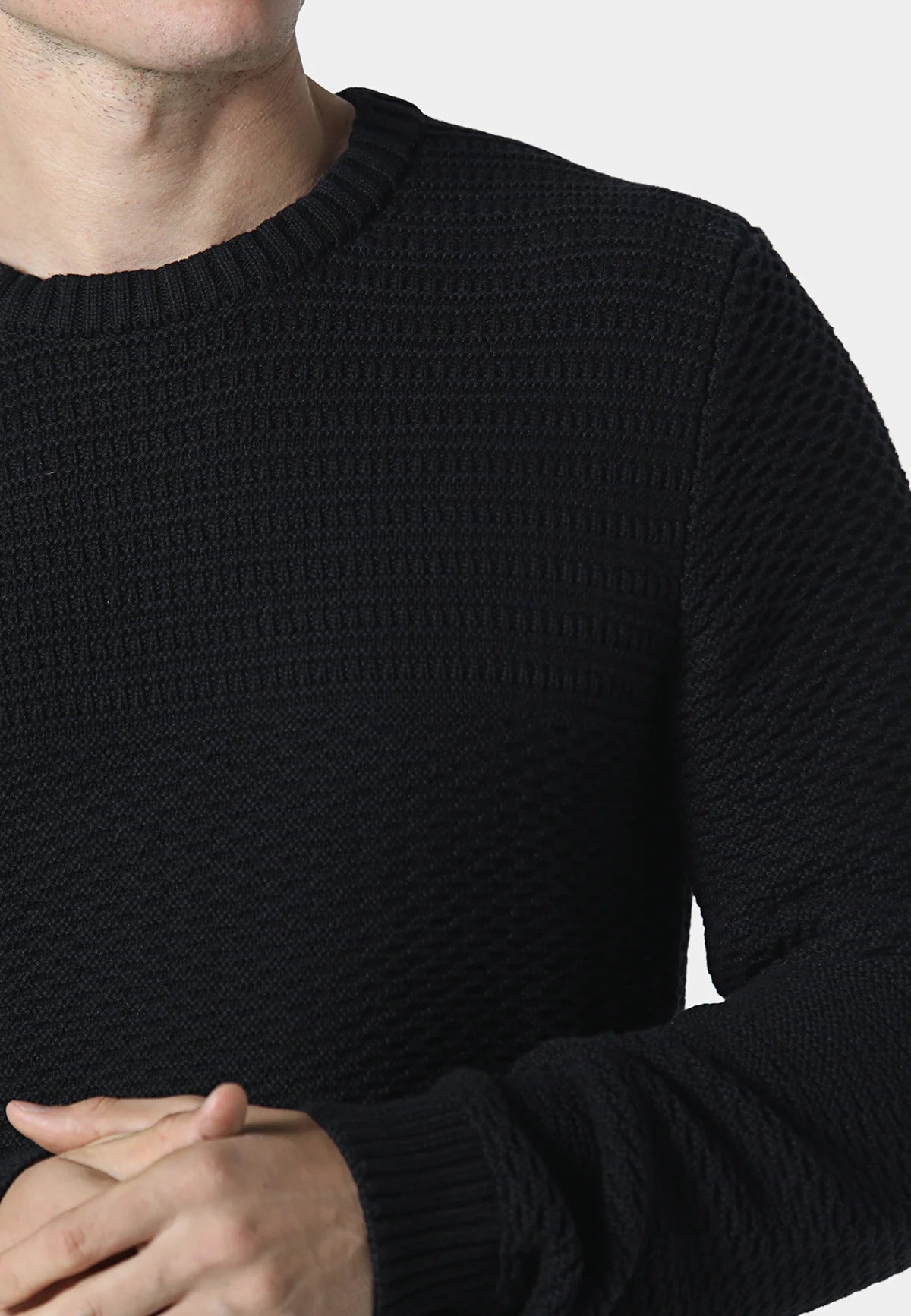 Black 883 Police Evaron textured crew neck knit jumper worn as an overshirt, featuring a stylish, textured knit fabric from Clique Kara.