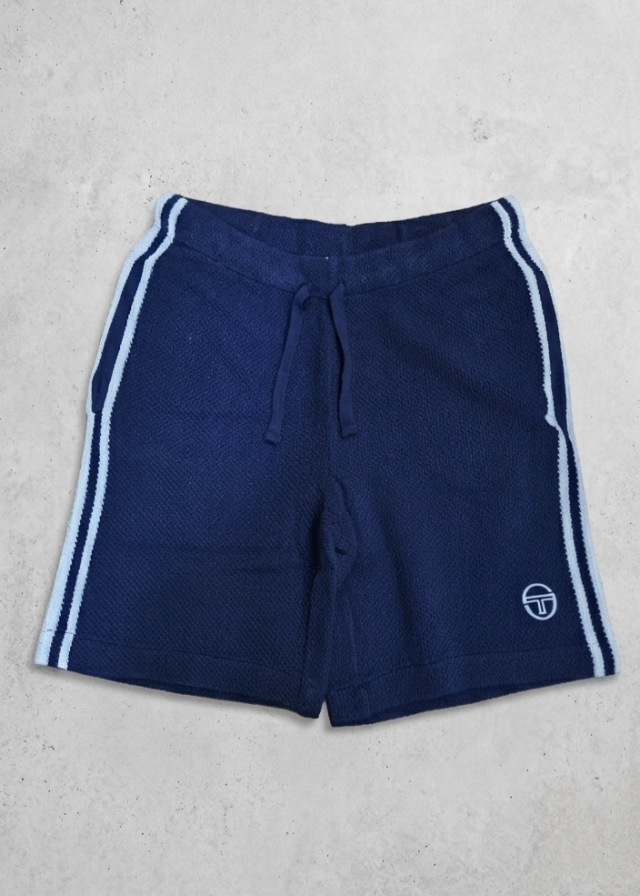Clique Sergio Tacchini Fratelli Crochet Short set in maritime blue and gardenia, featuring a stylish crochet design and matching shorts.