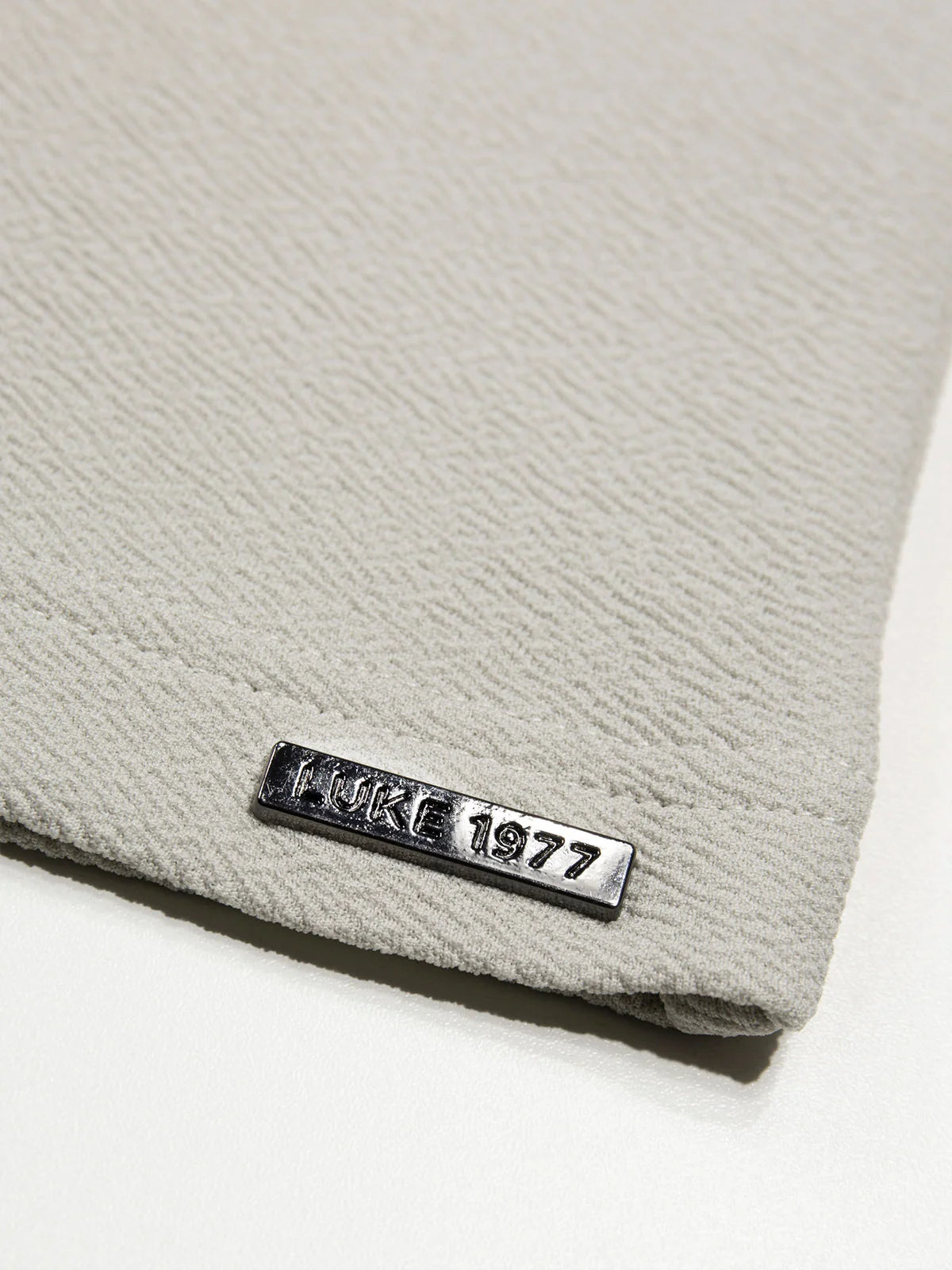 Luke 1977 Mykynos men's crinkle textured T-shirt in ice grey, showcasing the stylish fabric and casual fit.