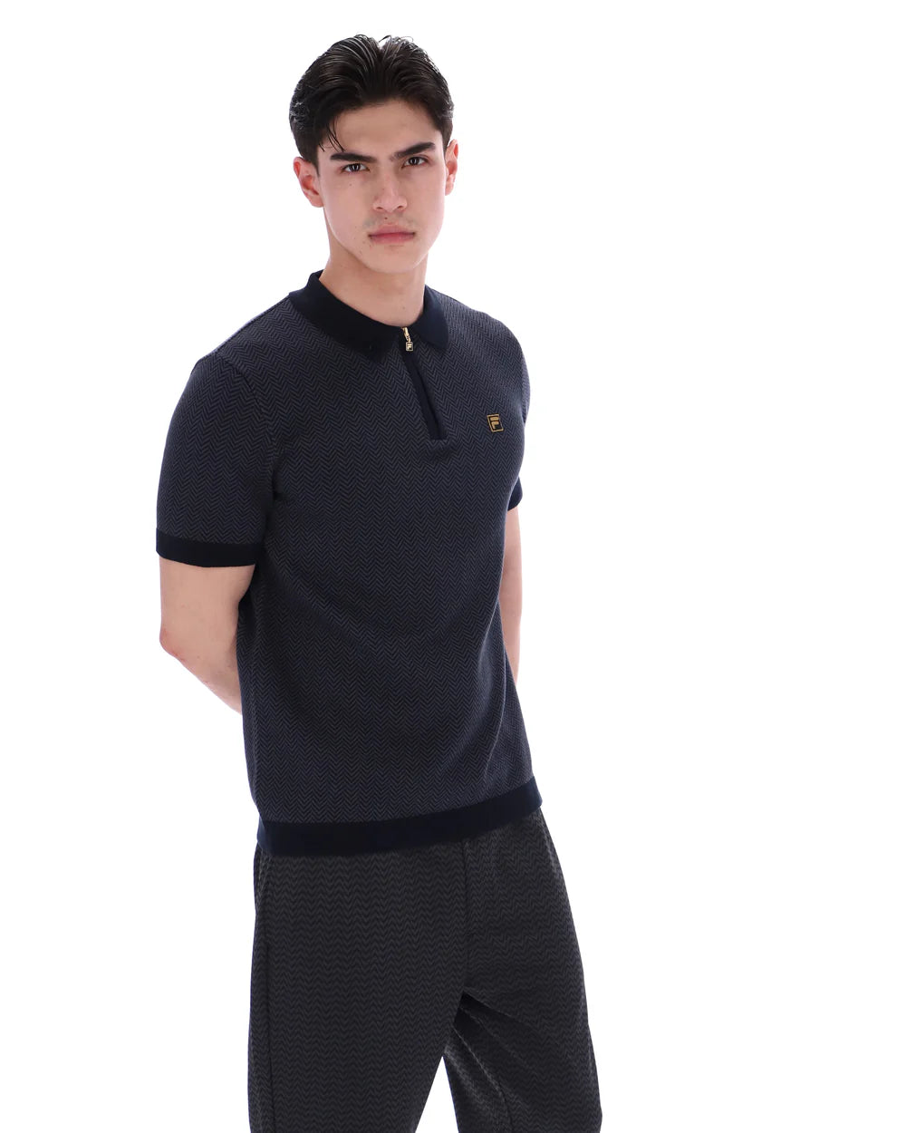 FILA Marty zip polo shirt by Clique in black and grey with a herringbone pattern, featuring a zip collar and classic fit.