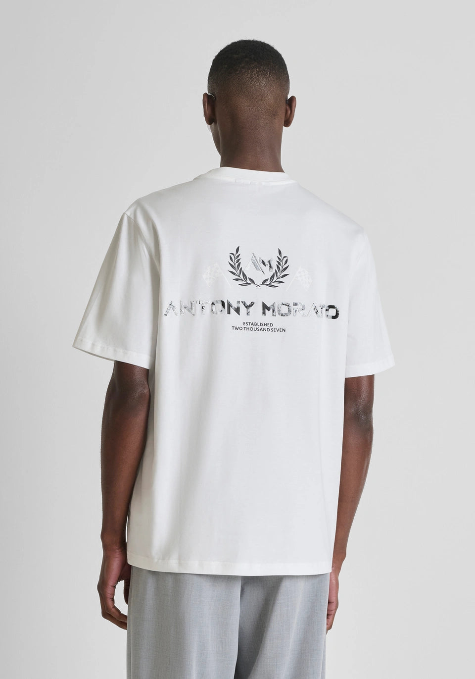 Clique Antony Morato relaxed fit white cotton jersey T-shirt with marble effect print, showcasing casual style and comfortable fit.