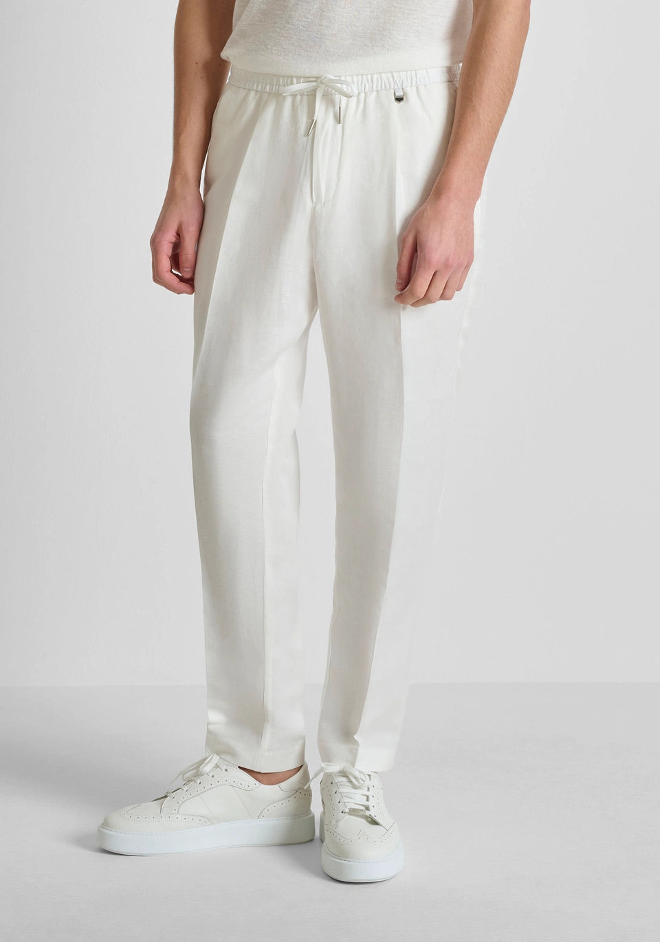 Cream Antonty Morrato Neil regular-fit linen blend trousers by Clique, shown in a natural pose highlighting the fabric and fit.