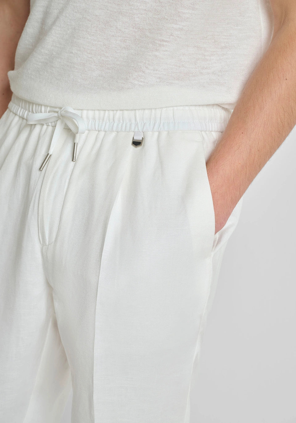 Clique Antonty Morrato "NEIL" cream linen blend regular-fit trousers displayed on a model.