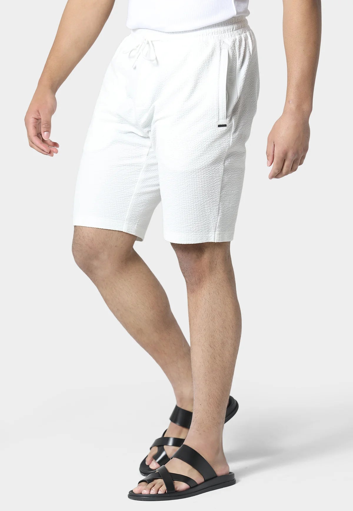 Clique 883Police Picton jog shorts set in white, featuring a comfortable, casual design with shorts and matching top.