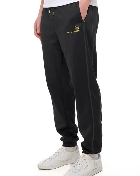 Black Sergio Tacchini Cassio Track Pants by Clique Kara, featuring gold accents, casual jogger style, and comfortable fit.
