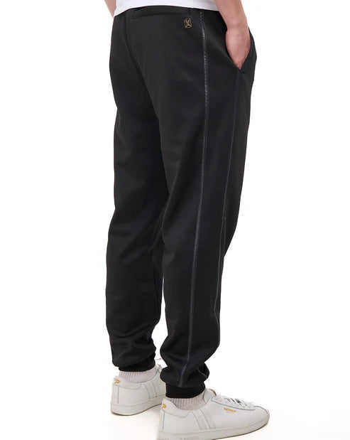 Sergio Tacchini Cassio black and gold track pants, Clique Kara sweats and joggers, with side pockets and elastic waistband.
