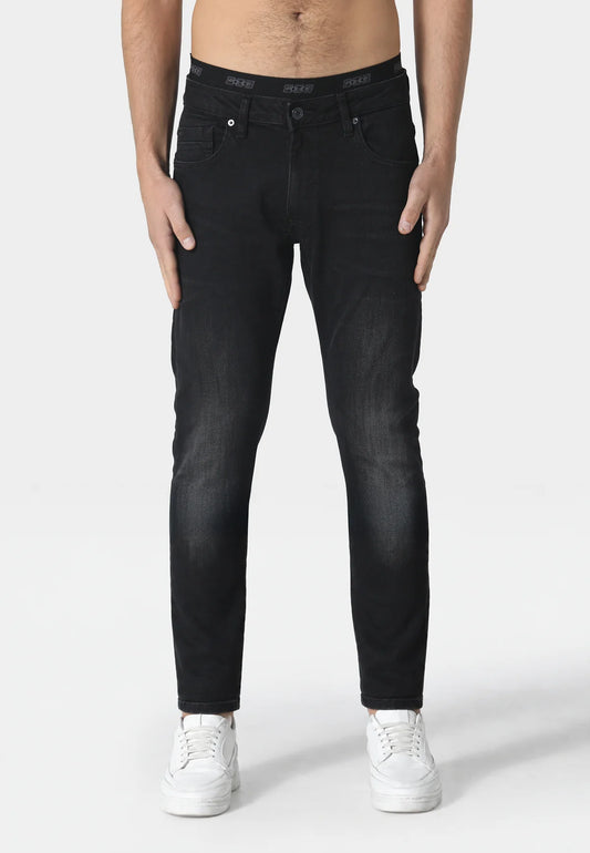 Black Dino Slim jeans by Clique Kara from 883 Police, shown on a model with a focus on fit and denim texture.