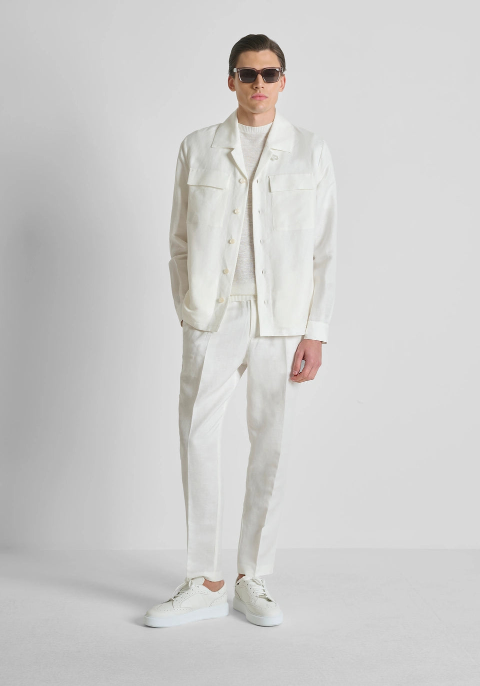 Cream Antonty Morrato Neil regular-fit trousers in linen blend from Clique, shown on a model with a relaxed fit.
