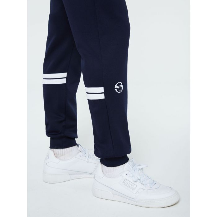 Sergio Tacchini New Reno Track Top in maritime blue, adrenaline ruch, and white, displayed on a hanger with a white background.