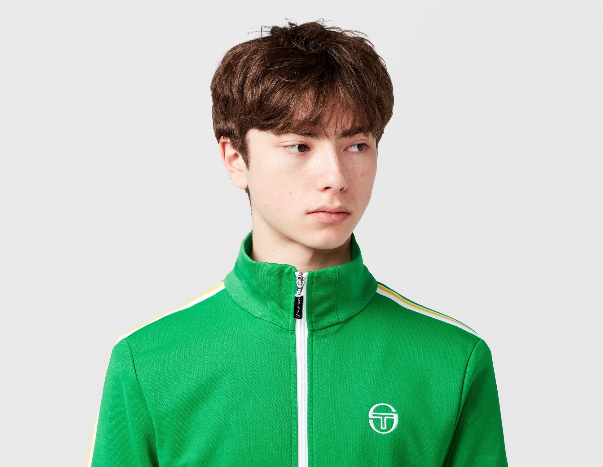 Clique Sergio Tacchini Franco Track Top in fern green and white, featuring a sporty design and zip-up front.