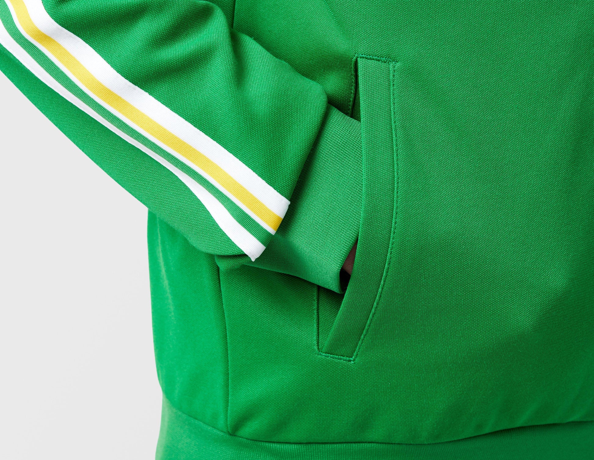 Clique Sergio Tacchini Franco track top in fern green and white, featuring sporty design and logo details.